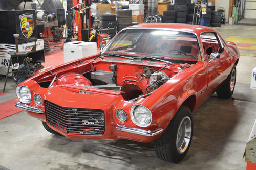 The Camaro with no seats and no engine, before its Shark Gray paint job.The Camaro with no seats and no engine, before its Shark Gray paint job.